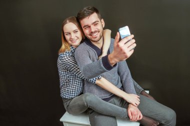 Couple making a funny selfie