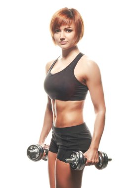 Portrait of young redhead athlete looking and smiling at camera