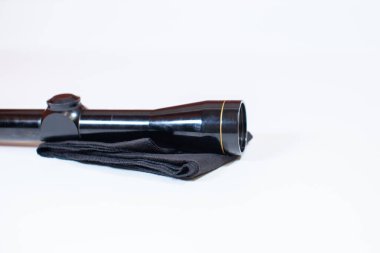 A compact, 3x9 magnification scope sits on a white background, ready to be mounted on a rifle to help a hunter see his target