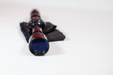 A compact, 3x9 magnification scope sits on a white background, ready to be mounted on a rifle to help a hunter see his target