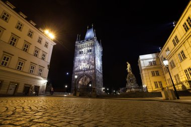 Prague, Old Town tower of Charles Bridge in the night clipart