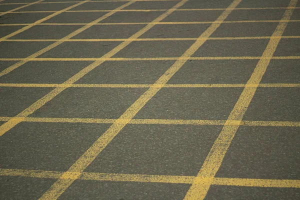 Junction markings for cars. Yellow markings to deal with traffic jams at crossroads. — Stock Photo, Image