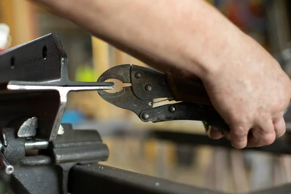 Fixing Part Forceps Man Prepares Metal Processing Master Hands Hold — Stock Photo, Image