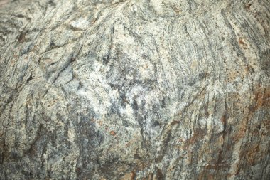 Doğal taş. Gün ışığında taşın dokusu. Granit arka plan.