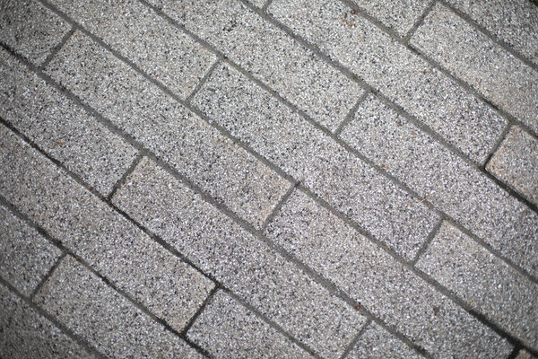 Paving slabs texture. Road surface. Pedestrian area background.