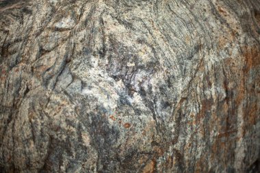 Doğal taş. Gün ışığında taşın dokusu. Granit arka plan.