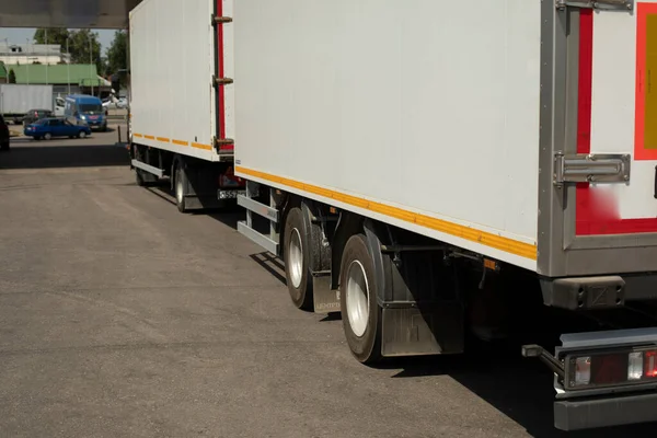 Freight transport. Trailer with a trailer. The car is being prepared for dispatch.