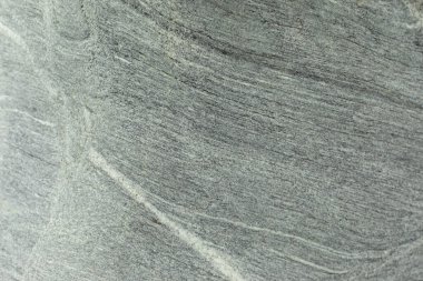 Beyaz lekeli taş dokusu. Kayadaki desen. Doğal taşın güzel arkaplanı.