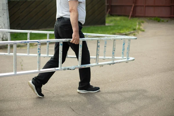 Man Carries Ladder Guy Dragging Ladder Gardener Took Tool Man — Stock Photo, Image