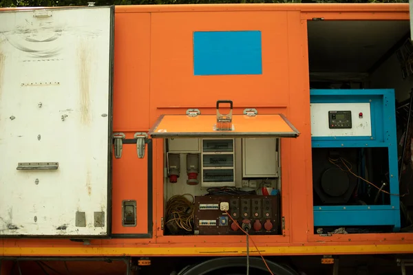 Special machine for servicing gas networks. Specialized transport with gas metering equipment. The work car is orange.