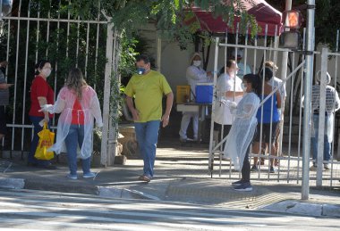 Flu vaccination campaign. March 23,2020,Osasco,Sao Paulo,Brazil: The first day of vaccination campaign against influenza and H1N1 flu held at health center UBS Helena Marry 