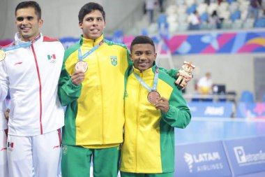 Peru - Lima, 02 / 08 / 2019 - LIMA, PERU, 02.08.2019: PAN-SALTO SINCRONIZADO 10 METROS - Podio ouro para Mexico, prata Canada e Bronze para o Brasil, no salto sincronizado plataforma de 10nmetros masino, durante os Jogos Pan-Americanos de Lima, no Per