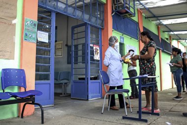 (Sao Paulo 'daki Paulista Bulvarı' nda kurulan çadırda Covid-19 'a karşı aşı. 25 Temmuz 2021, Sao Paulo, Brezilya: İnsanlar 25 Pazar günü Sao Paulo 'da Paulista Bulvarı' nda kurulan bir çadırda Covid-19 'a karşı aşılandı. Belediye Başkanı Ricardo Nunes