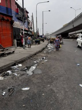 March 28,2020,Lagos,Nigeria: Movement of people during the Coronavirus pandemic, some stores are closed to the public and the government also made lavatories available for people 