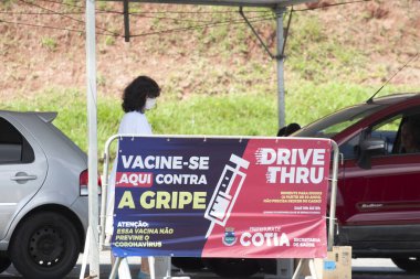 Flu vaccination campaign. March 23,2020,Osasco,Sao Paulo,Brazil: The first day of vaccination campaign against influenza and H1N1 flu held at health center UBS Helena Marry 