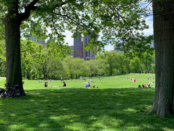 (NEW) Covid-19: Crowded Central Park. May 17, 2020, New York, USA: The Central Park in Manhattan is really crowded this sunny Sunday and people are seen having picnic, playing sports and having fun amid Coronavirus pandemic. The new extended stay at