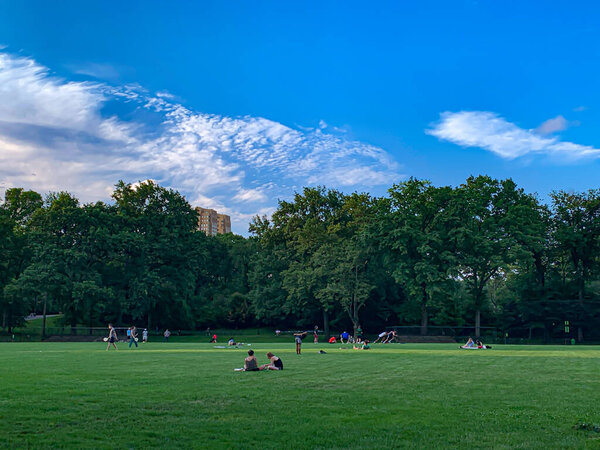 (NEW) Fun time at Central Park. July 16, 2020, New York , USA: As the weather seems very favorable hot, people, including children, are seen practicing sports and playing at Central Park amid Covid-19 reopening phase