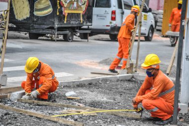 Covid-19 'un ortasında sokak temizliği. 29 Eylül 2020, Sao Paulo, Brezilya: Sao Paulo Belediyesi çalışanları şehrin doğu bölgesindeki Lapa, Covid-19 'un ortasında caddeleri temizlerken görüldü. 