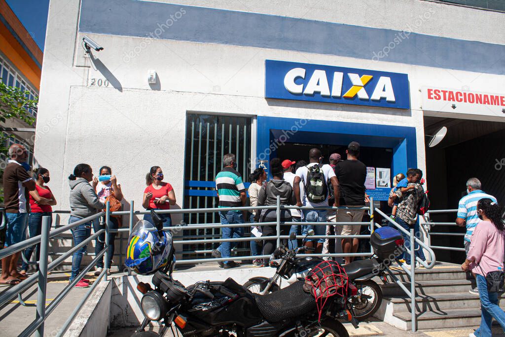 (INT) Covid-19:Emergency aid.April 29,2020,Cotia,Sao Paulo,Brazil:People face a queue at a bank branch of Caixa Economica Federal (CEF) in Granja Vianna in the city of Cotia, Sao Paulo, this Wednesday, 29, due to the possibility of withdrawing the em