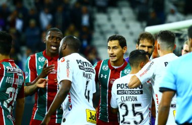 SAO PAULO - 22 Eylül 2019: CORINTHIANS-FLUMINENSE Pedrinho, Sao Paulo 'nun doğu yakasındaki Arena Corinthians' da Copa Sudamericana 'nın çeyrek finali için geçerli bir maçta Caio Henrique' e hareket ediyor.