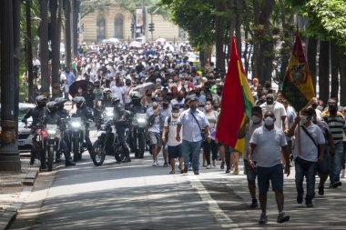 Joao Doria 'nın önünde protesto. 15 Mart 2021, Sao Paulo, Brezilya: Bir grup tüccar Avenida Sao Luiz ve Viaduto Jacarei boyunca yürüdü 
