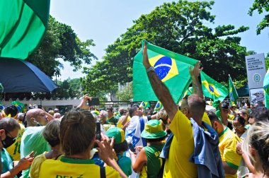  Rio de Janeiro 'da COVID-19 kısıtlayıcı önlemlerinin sona ermesini talep eden protesto. 14 Mart 2021, Rio de Janeiro, Brezilya: Protestocular Copacabana, Rio de Janeiro 'da bir protesto düzenlediler.