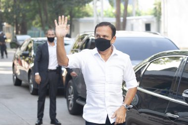  Brezilya Sağlık Bakanlığı 'na CORONONAVAC Aşısı teslimatı. 29 Mart 2021, Sao Paulo, Brezilya: Sao Paulo Valisi Joao Doria, 5 milyondan fazla Butantan Enstitüsü aşısının teslimatı için düzenlenen törene katıldı. 