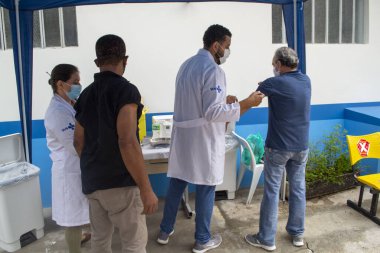  Sao Paulo 'da 80 yaşın üzerindeki yaşlı insanların aşısı. 1 Mart 2021, Sao Paulo, Brezilya: Bela Vista, Sao Paulo 'daki UBS HUMAITA' da (Temel Sağlık Birimi) 80 yaşın üzerindeki yaşlı insanlara karşı aşı