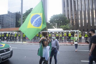 Sao Paulo Valisi 'ne karşı protesto. 19 Mart 2021, Sao Paulo, Brezilya: Protestocular Sao Paulo Valisinin ayrılmasını istiyorlar