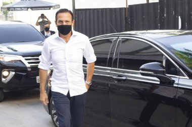  Brezilya Sağlık Bakanlığı 'na CORONONAVAC Aşısı teslimatı. 29 Mart 2021, Sao Paulo, Brezilya: Sao Paulo Valisi Joao Doria, 5 milyondan fazla Butantan Enstitüsü aşısının teslimatı için düzenlenen törene katıldı. 