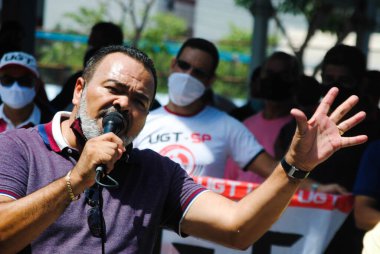 (Sao Paulo 'daki otobüs şoförleri ve kondüktörlerinin genel grevi. 24 Mart 2021, Sao Paulo, Brezilya: Jose Valdevan de Jesus Santos, otobüs şoförleri başkanı SINDMOTORISTAS