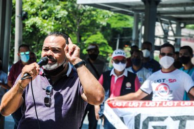 (Sao Paulo 'daki otobüs şoförleri ve kondüktörlerinin genel grevi. 24 Mart 2021, Sao Paulo, Brezilya: Jose Valdevan de Jesus Santos, otobüs şoförleri başkanı SINDMOTORISTAS