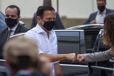  Brezilya Sağlık Bakanlığı 'na CORONONAVAC Aşısı teslimatı. 29 Mart 2021, Sao Paulo, Brezilya: Sao Paulo Valisi Joao Doria, 5 milyondan fazla Butantan Enstitüsü aşısının teslimatı için düzenlenen törene katıldı. 