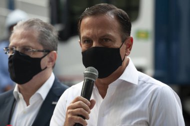  Brezilya Sağlık Bakanlığı 'na CORONONAVAC Aşısı teslimatı. 29 Mart 2021, Sao Paulo, Brezilya: Sao Paulo Valisi Joao Doria, 5 milyondan fazla Butantan Enstitüsü aşısının teslimatı için düzenlenen törene katıldı. 