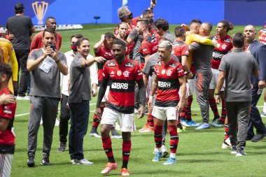 Flamengo Süper Kupa Finalini kazandı. 11 Nisan 2021, Brasilia, Federal Bölge, Brezilya: Flamengo oyuncuları Brezilya 'daki Mane Garrincha Stadyumu' nda oynanan Süper Kupa Finali 'nde Palmeiras' a karşı kazandıkları zaferi kutluyorlar. 