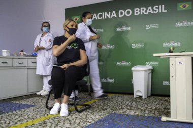 Sao Paulo Valisi Joao Doria 'ya Coronavac aşısı yapıldı. 7 Mayıs 2021, Sao Palo, Brezilya. Sao Paulo valisi Joao Doria (PSDB) ve First Lady Bia Doria, bir doz Coronavac alır.