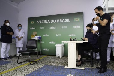 Sao Paulo Valisi Joao Doria 'ya Coronavac aşısı yapıldı. 7 Mayıs 2021, Sao Palo, Brezilya. Sao Paulo valisi Joao Doria (PSDB) ve First Lady Bia Doria, bir doz Coronavac alır.
