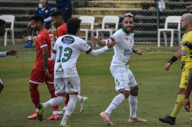 (Paulista Şampiyonası A2 serisi (ikinci lig) Portuguesa ve Audax arasında. 14 Mayıs 2021, Sao Paulo, Brezilya: Portekizli Raphael Luz, Portekiz ve Audax arasındaki maçta golü kutladı. 