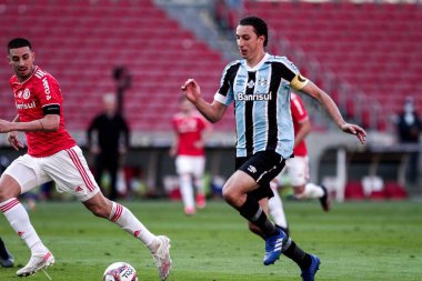 Inter, Gremio 'ya karşı Gaucho Şampiyonası finalinde oynuyor. 16 Mayıs 2021, Porto Alegre, Brezilya. Gremio 'dan Maicon, Gremio ve Internacional arasındaki maç sırasında Gaucho Şampiyonası 2021 finalinin ilk maçı için geçerlidir.