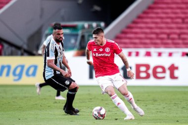 Inter, Gremio 'ya karşı Gaucho Şampiyonası finalinde oynuyor. 16 Mayıs 2021, Porto Alegre, Brezilya. Gremio 'dan Maicon, Gremio ve Internacional arasındaki maç sırasında Gaucho Şampiyonası 2021 finalinin ilk maçı için geçerlidir.