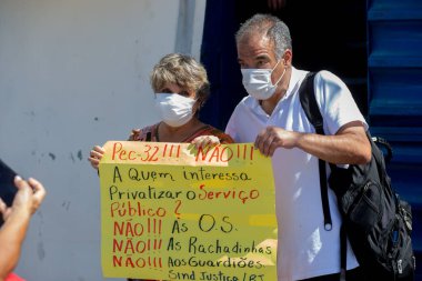 Birlik merkezleri ve sosyal hareketler Brasilia 'daki açlığı protesto ediyor. 26 Mayıs 2021, Brasilia, Brezilya: Birlik merkezleriyle bağlantılı protestocular ve sosyal hareketler Bolsonaro hükümetine karşı covid-19 aşısı için protesto eylemi 