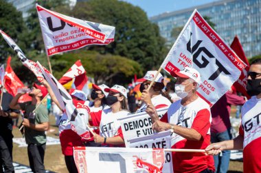 Birlik merkezleri ve sosyal hareketler Brasilia 'daki açlığı protesto ediyor. 26 Mayıs 2021, Brasilia, Brezilya: Birlik merkezleriyle bağlantılı protestocular ve sosyal hareketler Bolsonaro hükümetine karşı covid-19 aşısı için protesto eylemi 