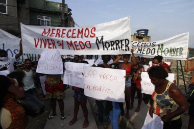 Morro da Providencia sakinlerinin protestosu. 27 Mayıs 2021, Rio de Janeiro, Brezilya: Morro da Providencia sakinlerinin şiddete karşı bir protestosu, Supervia kentsel trenlerinin dolaşımını ve VLT operasyonunu etkiledi. 