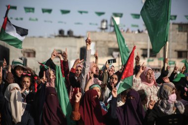 El Kassam Tugayları 'nın güney Gazze Şeridi' ndeki askeri geçit töreni. 29 Mayıs 2021 - Gazze Şeridi, Filistin Toprakları: Filistin hareketi Hamas 'ın askeri kanadı Izz al-Din el-Qassam Tugayları' ndan silahlı adamlar