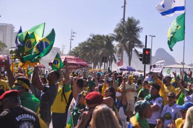 Rio de Janeiro 'daki Başkan Jair Bolsonaro' nun yazılı oylaması ve hükümeti lehine hareket edin. 27 Haziran 2021, Rio de Janeiro, Brezilya: Sağcı gruplardan protestocular Bolsonaro hükümetini desteklemek ve oy kullanmak için bir eyleme katıldılar