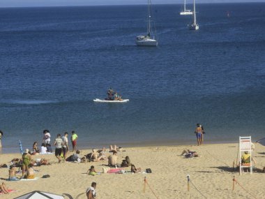 June 30, 2021, Cascais, Portugal: Movement of bathers at Conceicao beach, in  district of Cascais, on Wednesday (30). Due to abundance of wind, place is much sought after by surfers