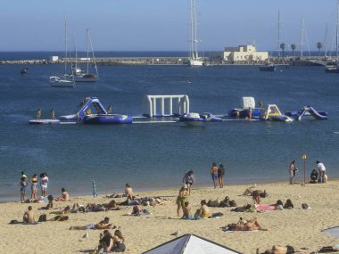 June 30, 2021, Cascais, Portugal: Movement of bathers at Conceicao beach, in  district of Cascais, on Wednesday (30). Due to abundance of wind, place is much sought after by surfers