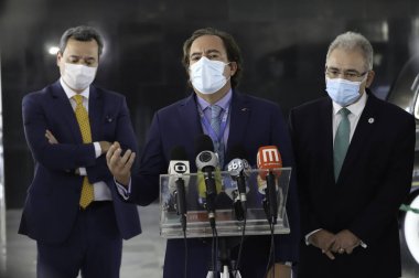 Sağlık Bakanlığı, Covid-19 aşısı için öncelikli grupta çalışan banka çalışanları ve posta çalışanlarını içeriyor. 6 Temmuz 2021, Brasilia, Federal Bölge, Brezilya: