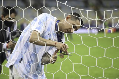 Copa America 'nın Arjantin şampiyonu. 10 Temmuz 2021, Rio de Janeiro, Brezilya: Arjantinli oyuncular, Maracana Stadyumu 'nda Cumartesi gecesi oynanan futbol karşılaşmasında Brezilya' yı 1-0 yenen Copa America şampiyonluğunu kutladılar (10).).