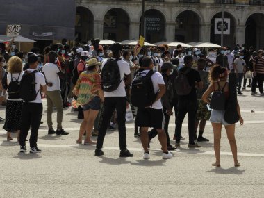 Lizbon 'daki Comercio Meydanı' nda Portekiz 'de yaşayan göçmenler protesto ediyor. 11 Temmuz 2021, Lizbon, Portekiz: Portekiz 'de yaşayan göçmenler Lizbon' daki Comercio Meydanı 'nda bir gösteri düzenlediler.